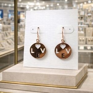Gold circle Earrings with love engrave.